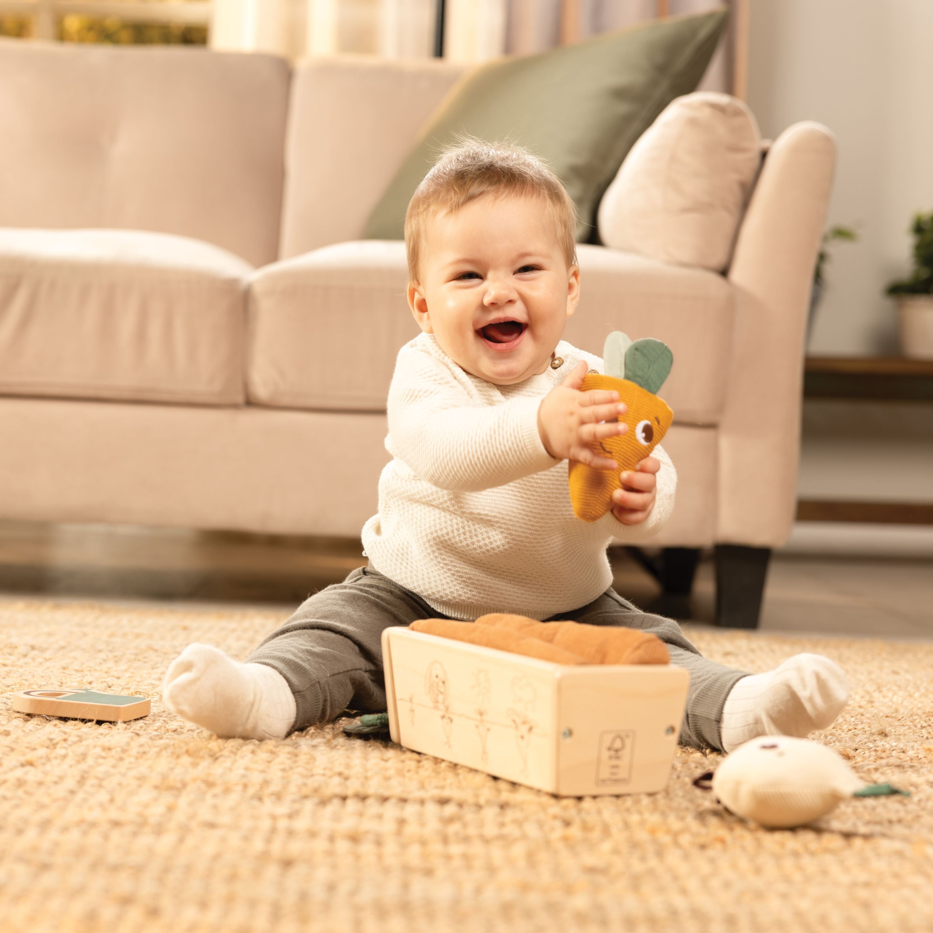 My First Garden - toddler playing with carrot