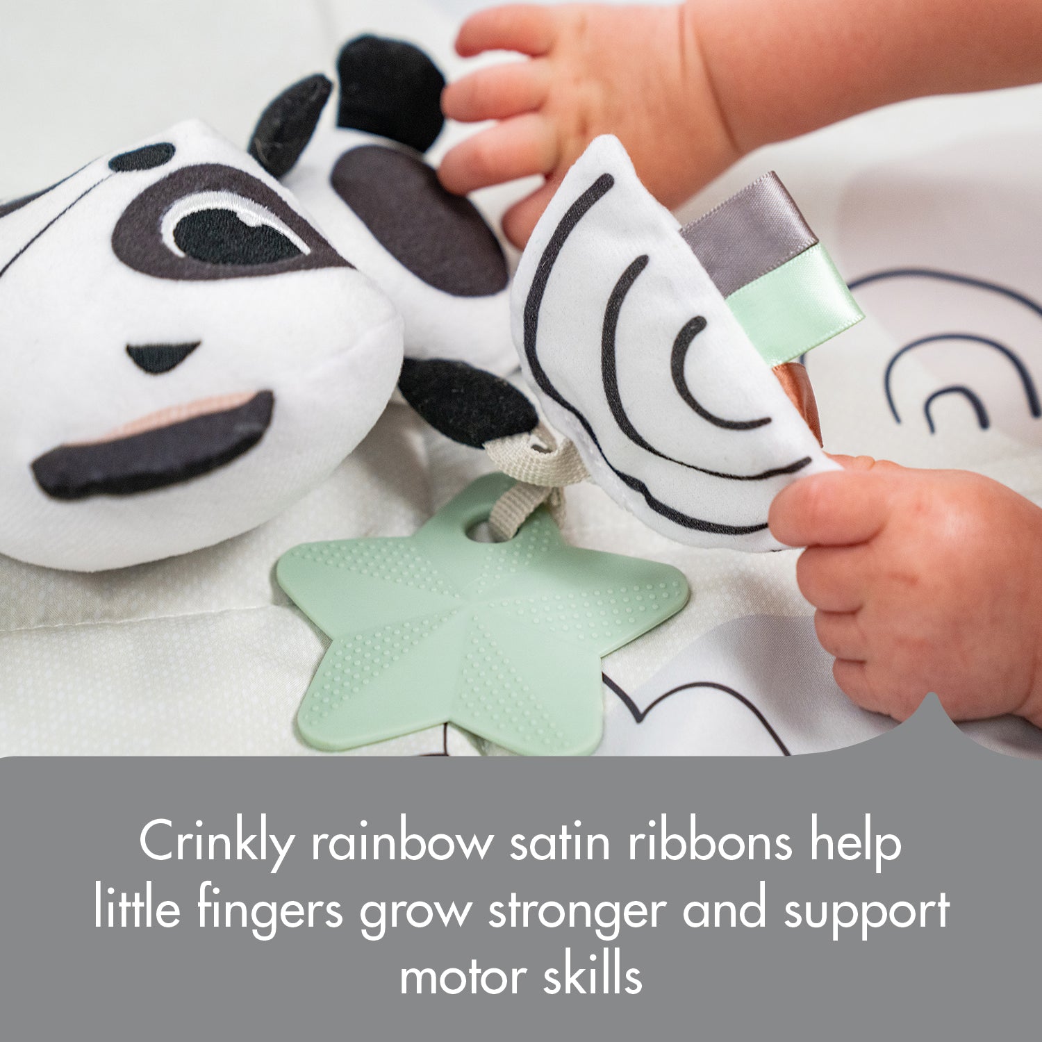 Panda Take Along Rattle Toy - crinkly rainbow satin ribbons help little fingers grow stronger and support motor skills