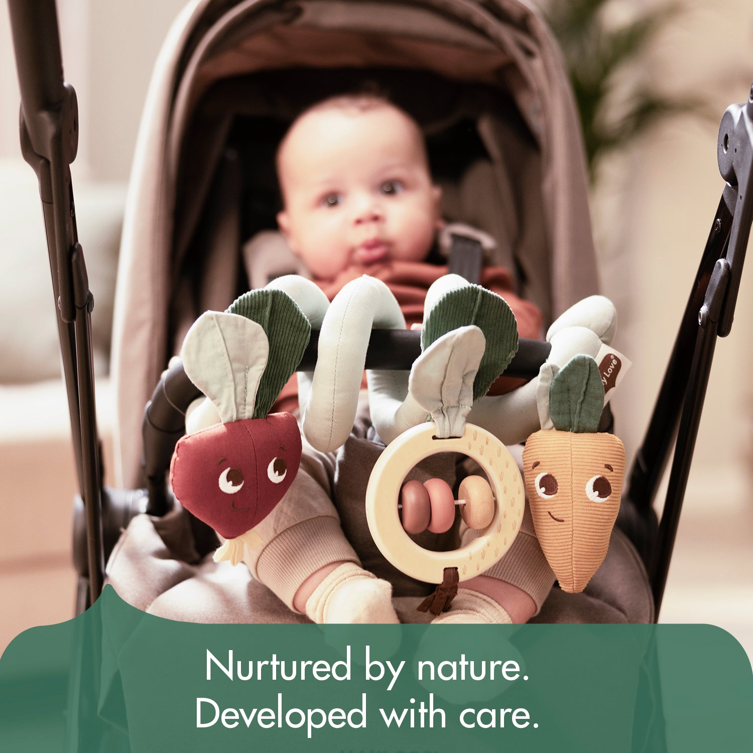 Spiral Stroller Activity Toy - nurtured by nature. Developed with care.