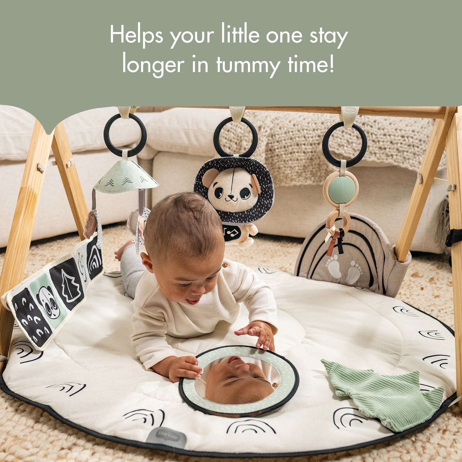 Luxe Developmental Gymini - helps your little one stay longer in tummy time!